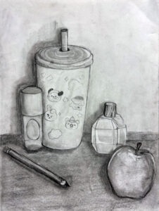 A drawing of an apple, coffee cup and cigarette.