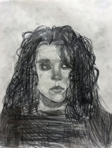 A drawing of a woman with long hair.