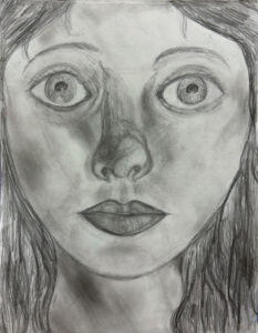 A drawing of a woman 's face with eyes open.