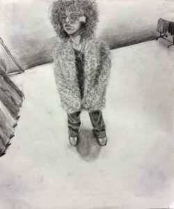 A person standing in the snow wearing a fur coat.