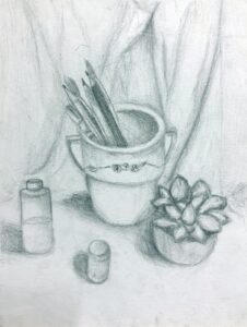 Pencil sketch of art supplies and a succulent plant on a draped surface.