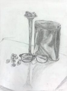 Pencil sketch of sunglasses, a cylindrical container, and scattered small objects on a surface.