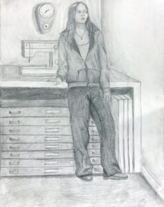 Pencil sketch of a relaxed person leaning against a cabinet in a casual setting.